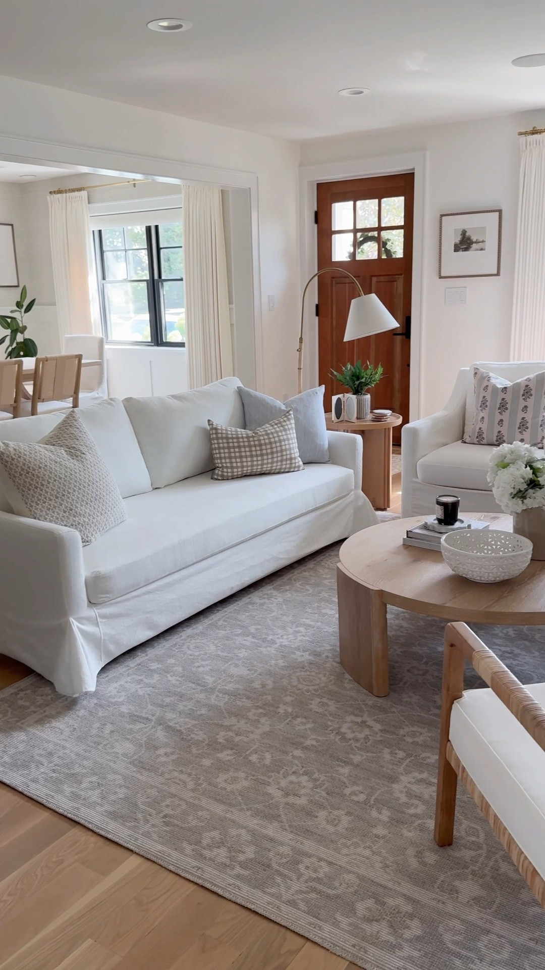 #ad Creating a cozy, inviting living room that is neutral yet cozy. I pulled this space together with a few of my favorite Wayfair finds—from an affordable quick-ship slipcovered sofa and a neutral patterned rug to a round coffee table, faux citrus tree, and layered décor that make the room feel warm, lived-in, and timeless. I love mixing classic, high-impact staples with smaller styling pieces to create a space that's beautiful, functional, and made for everyday life. @wayfair #Wayfair #WayfairPartner

#LTKSeasonal #LTKHome #LTKSaleAlert
