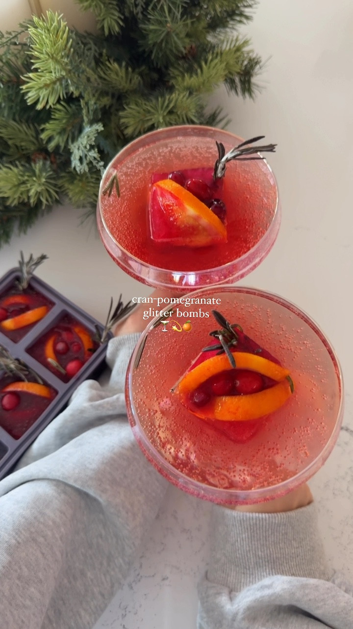 cran-pomegranate glitter bombs 💫 | add to Prosecco or any sparkling soda for a festive cocktail/mocktail! 🍸

cran-pomegranate juice
pomegranate seeds
orange slices 
cranberries 
rosemary 
@fancysprinkles edible glitter 

-freeze overnight ✨
#christmascheer #tistheseason #christmasideas #christmasparty #partyideas #prosecco #christmasdrinks #holidaycheer #proseccococktails 

#LTKParties #LTKHome #LTKHoliday