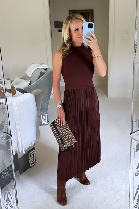 The perfect sweater dress for early fall
Chocolate brown sleeveless sweater, dress with accordion pleat silk skirt 
Fits true to size I’m wearing extra small 
Under $100 
Best brown leather knee-high boots 

#LTKunder100 #LTKover40 #LTKshoecrush