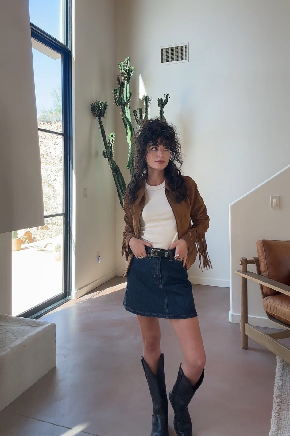 Love a classic look with basics from my closet. Denim mini skirt and a classic white tee. I added my go to fall jacket with fringe for a bit of a western look and my favorite Tecovas Black cowgirl boots  

#LTKSeasonal #LTKFindsUnder100 #LTKStyleTip