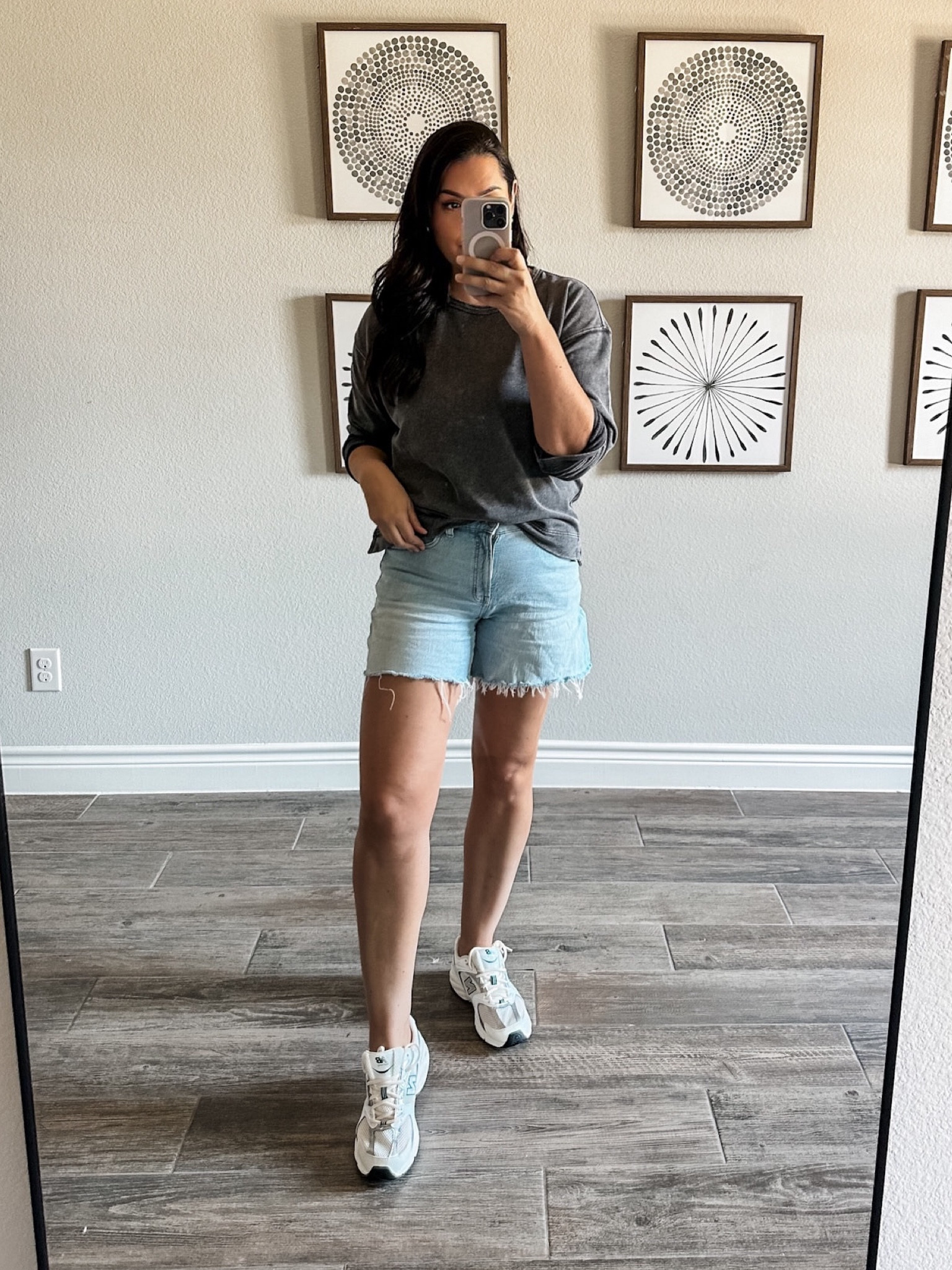 This is a ‘sweatshirt’ but really more of a French Terry fabric. I would describe it as thick, high quality tee in a sweatshirt form with the banded hem and cuffs. I really like how they paired it with black trousers, too (click through to see).

I’m in the large, could have done the medium. This top runs geneorusly in my opinion.

Also really love this pair of ‘dad’ sneakers from New Balance. Hella comfortable and more lightweight than I was expecting! TTS, I got my typical size 10. 