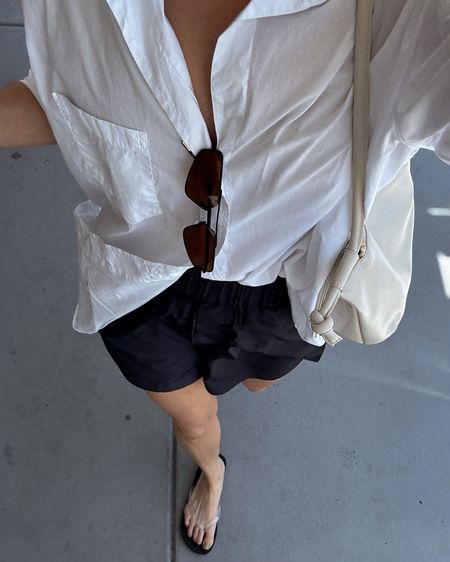 Frank and Eileen button down- runs oversized I wear tts small 
Bag- code MODE15 for 15% off first orders at Freda Salvador 
super soft leather 
Clear jelly sandals a great inexpensive alternative to The Row for under $20- I took true to size but run small 

#LTKSeasonal #LTKShoeCrush #LTKStyleTip