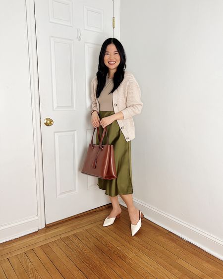 Beige cardigan 
Beige t-shirt (XS)
Olive green skirt (S)
Dark brown tote bag
White pumps (1/2 size up)
Smart casual outfit 
Teacher outfit 
Spring work outfit 
Spring outfit 
Neutral outfit

#LTKworkwear #LTKSeasonal #LTKfindsunder100