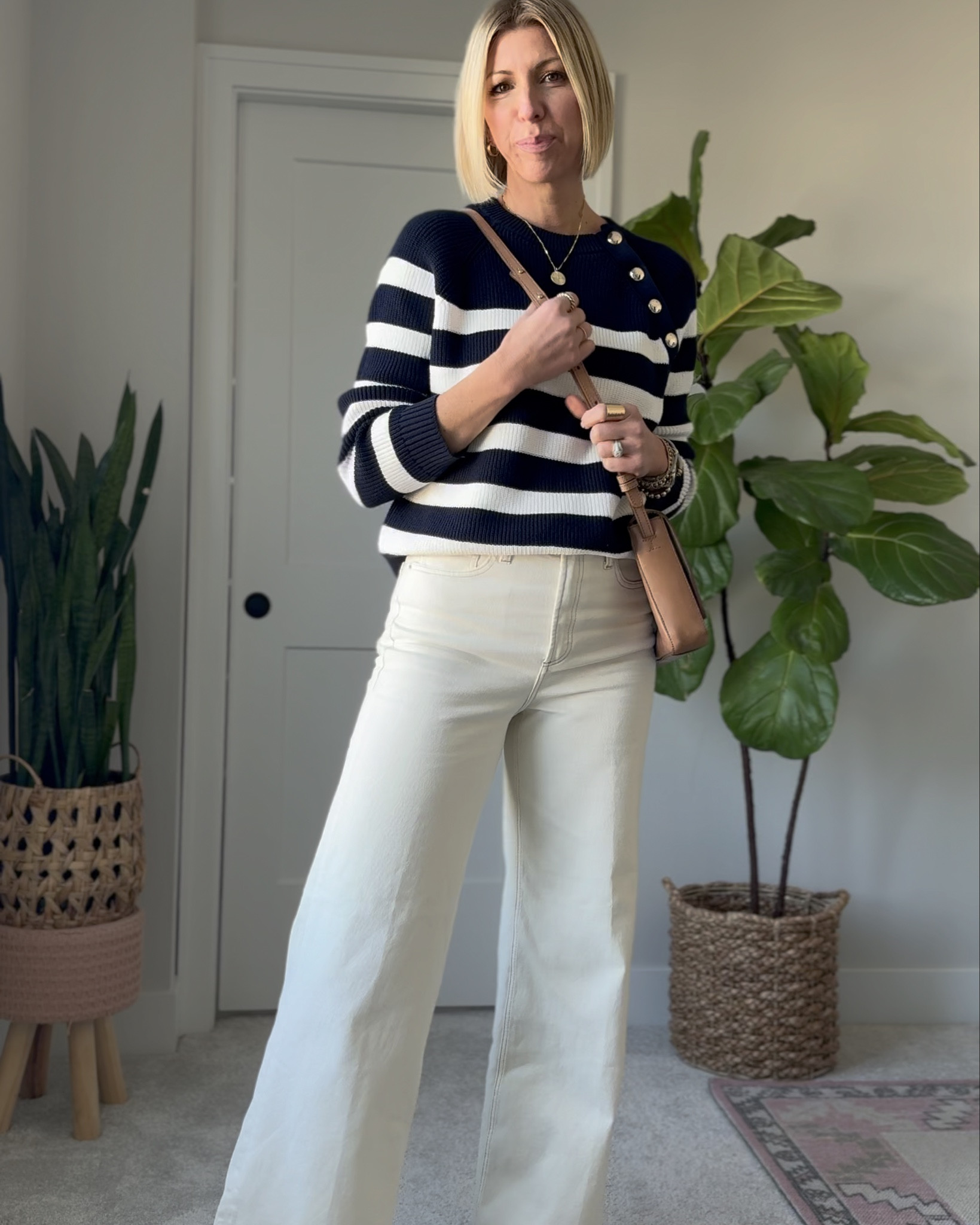 Easy spring outfit with cream wide leg jeans, stripe sweater, trench coat! You can either wear leather sandals or ballet flats 



#LTKover40 #LTKstyletip #LTKVideo