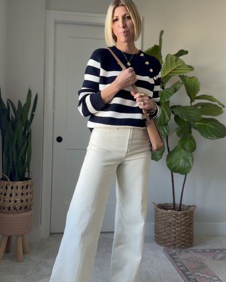 Easy spring outfit with cream wide leg jeans, stripe sweater, trench coat! You can either wear leather sandals or ballet flats 



#LTKover40 #LTKstyletip #LTKVideo