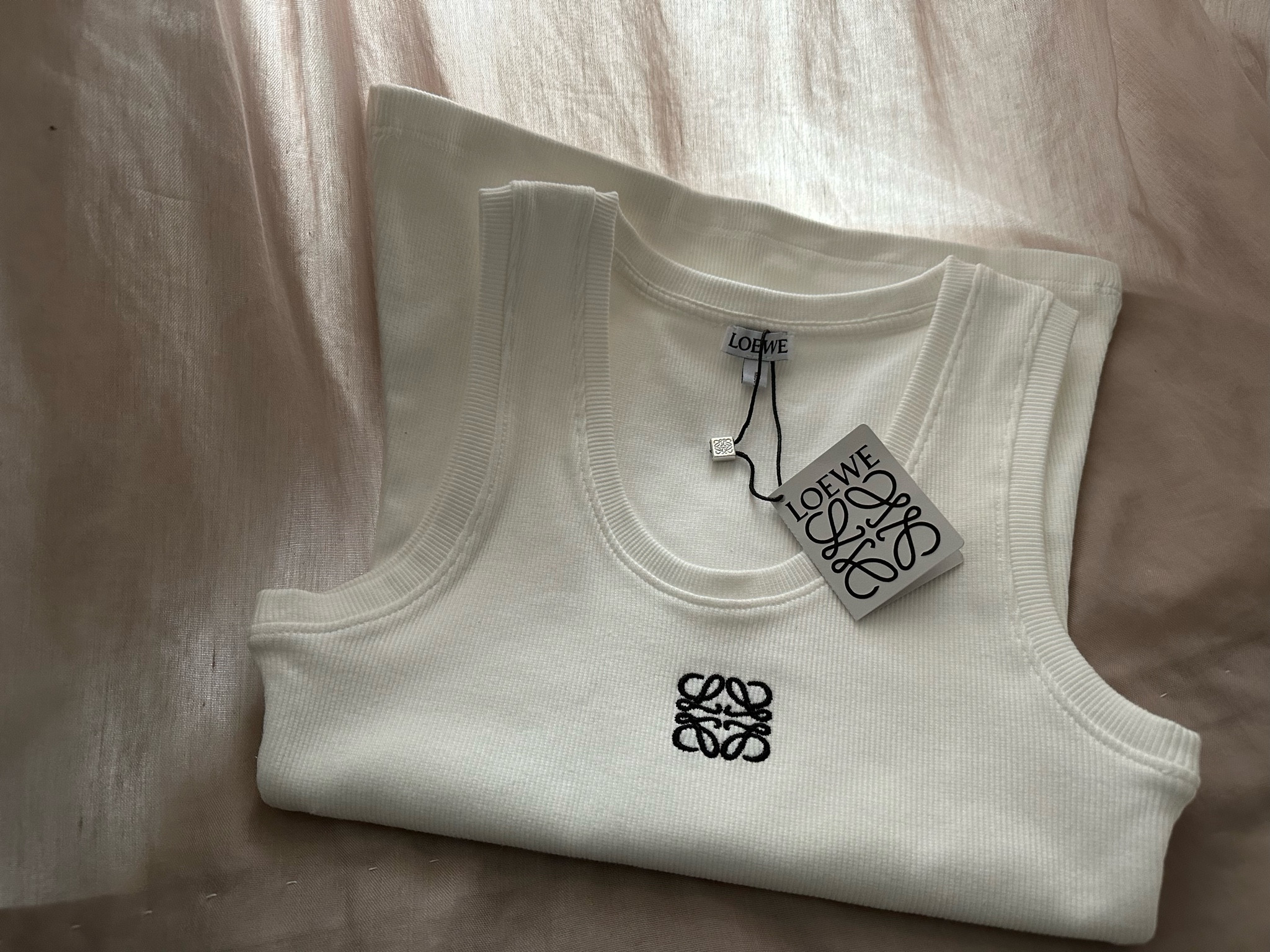 My new #Fave #GoTo #TankTop #Loewe #LoeweTankTop #style #fashion #casualtank 

#LTKstyletip #LTKover40 #LTKGiftGuide