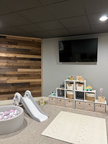 Playroom. Playroom ideas. Organization ideas. Home organization. Playroom cube organizer. Accent wall. Toddler slide. Playmat. Montessori toys. Playroom inspo. Baby playroom. Toddler playroom. 

#LTKbaby #LTKhome