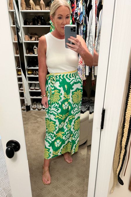 Fun vacation outfit idea. Will be going with me to Palm Beach soon. Loving this green print wrap skirt. Size 6. Has a matching top available. 

#LTKOver40 #LTKSeasonal #LTKTravel