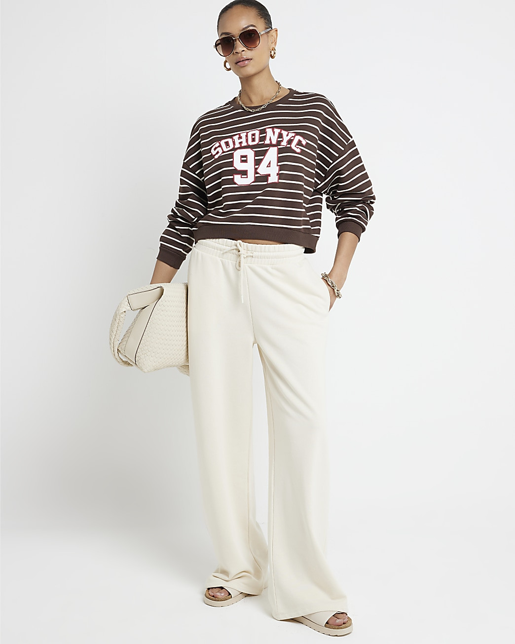 Brown stripe NYC cropped sweatshirt | River Island (UK & IE)