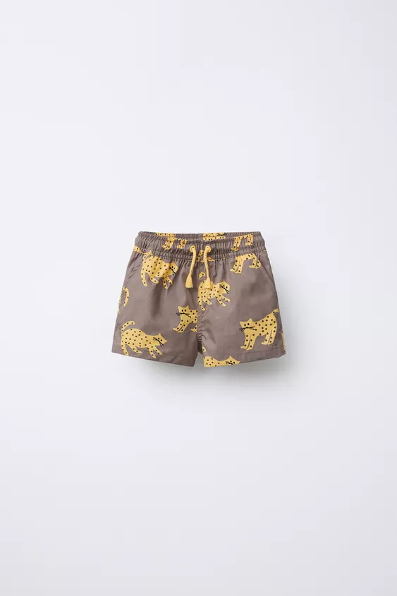 Swim shorts with elastic waistband and adjustable front drawstring. Front pockets. Kitten print. | Zara US