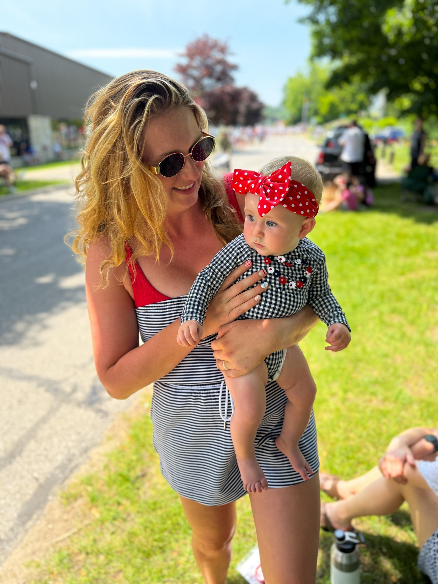 Fourth of July parade with my baby girl! ❤️ definitely could have done true to size (medium) linked up baby girls one piece gingham rash guard too 

#LTKSwim #LTKBaby #LTKSaleAlert