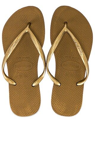 Slim Flip Flop in Bronze | Revolve Clothing (Global)