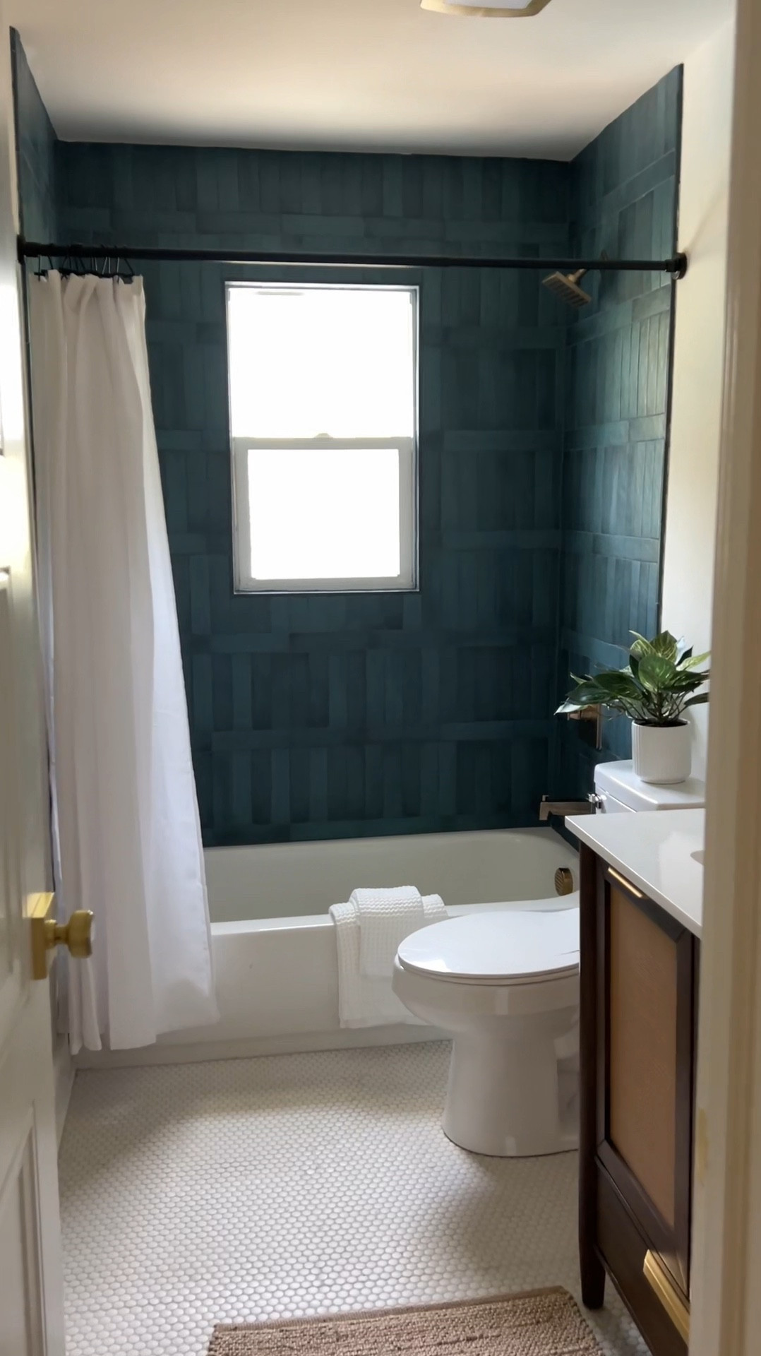 We are loving this guest bathroom transformation! The blue shower tile adds a little pop and personality.

#LTKHome