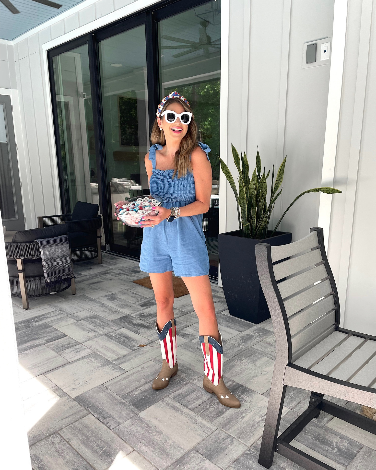 In a medium denim romper and white sunglasses from Amazon, American flag boots from nasty gal, patriotic headband from shop dandy boutique - all fits TTS.

#LTKshoecrush #LTKSeasonal #LTKunder50