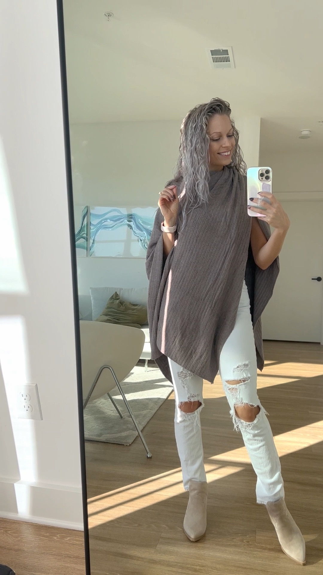 This wrap from barefoot dreams is so comfortable for lounging around the house, wearing to travel or for a fun fall day!

#LTKtravel #LTKSeasonal #LTKworkwear