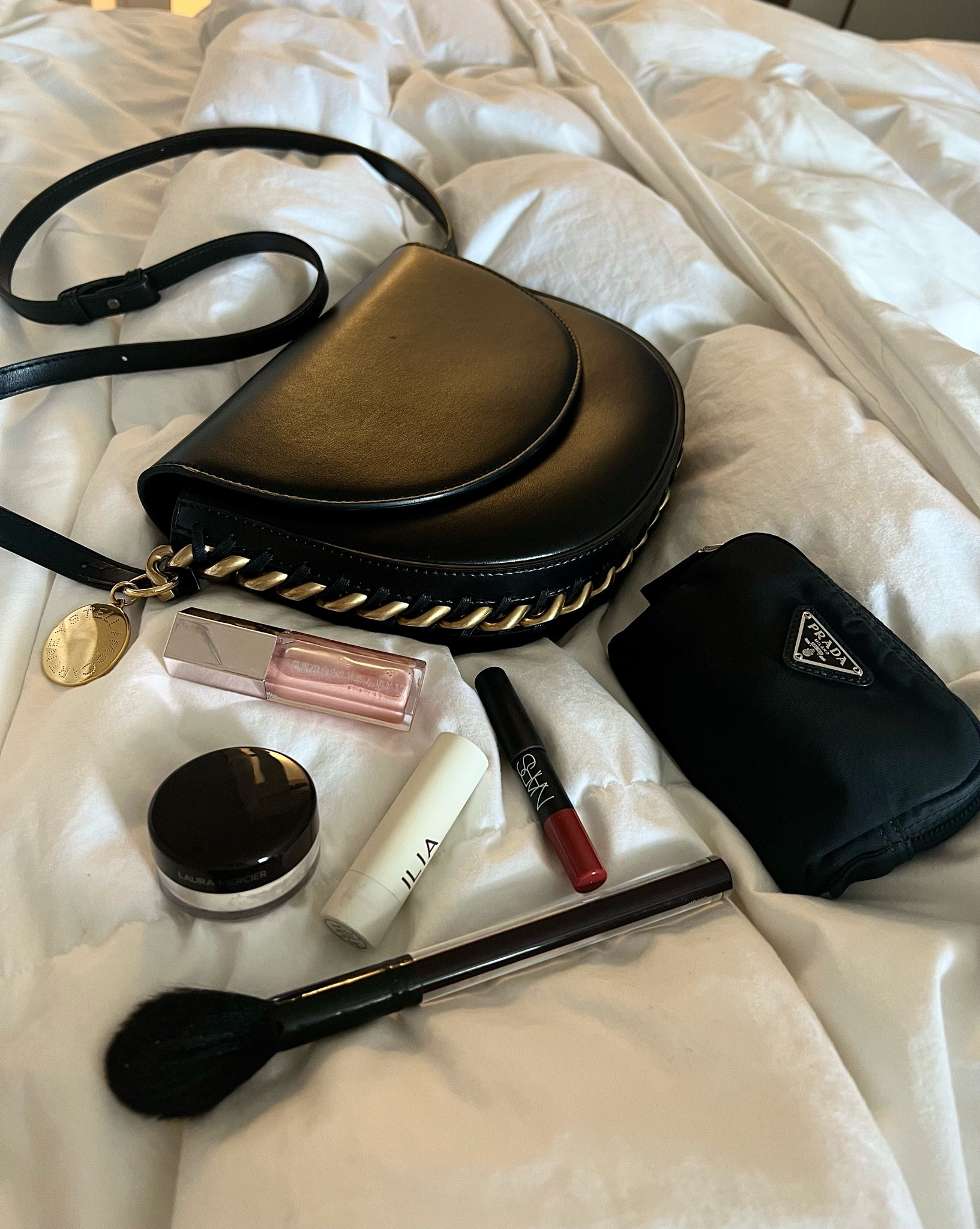 My daily obsessions..never leave home without 🖤 my favorite powder, red lip balm, sparkle clear gloss , best little credit card wallet and my go to lip crayon. 

#LTKFind #LTKbeauty #LTKstyletip