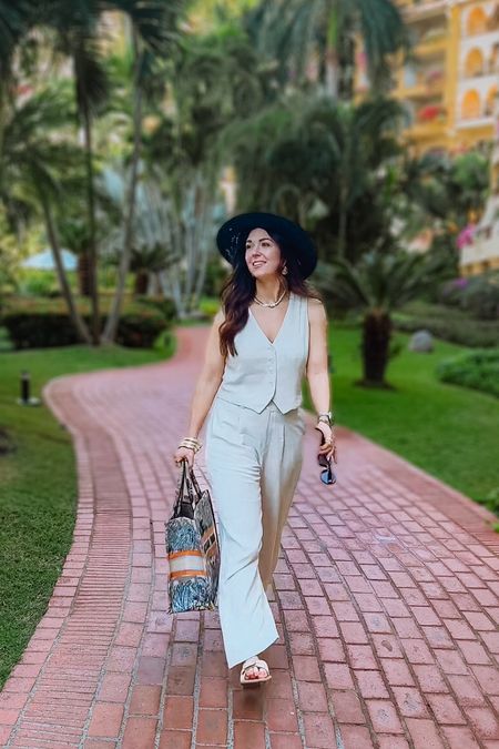 Love this linen vest and pants set. Comfy enough to wear on the plane and then arrive in style at the resort, ready to enjoy vacay! #vacationoutfit #linenset #linenpants #vacationstyle 

#LTKtravel #LTKfindsunder100 #LTKstyletip