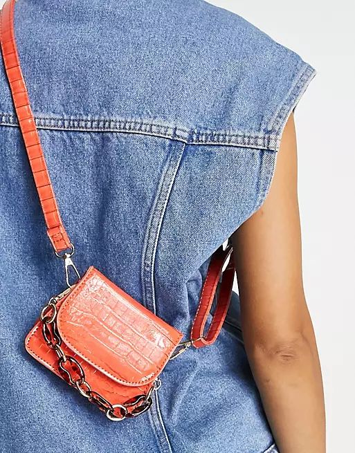SVNX croc cross body bag with chunky chain in bright orange | ASOS (Global)