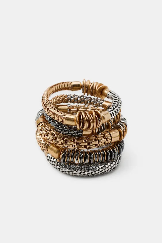 Pack of five elastic bracelets featuring an assortment of mixed metal appliqu\u00e9s. | Zara US