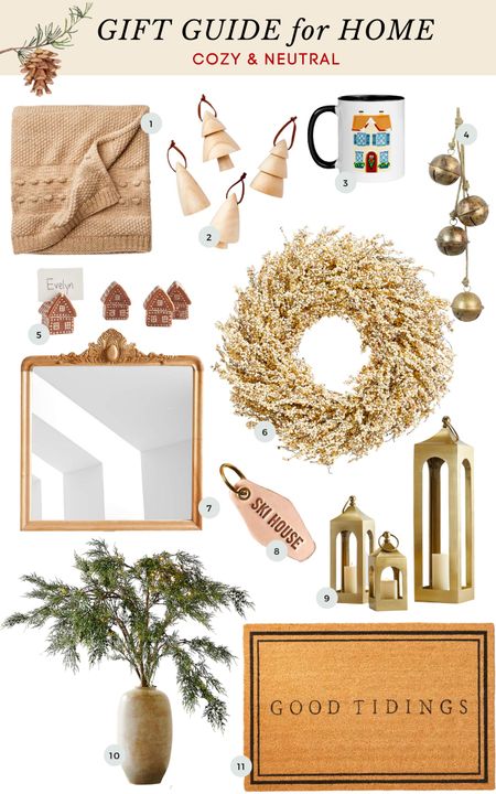 Neutral and cozy Christmas decor ideas include camel knit throw, wood tree ornaments, English cottagecore mig, brass bells, gingerbread place holders,  carved wood mirror, white berry wreath, leather key tag, brass lanterns, and coir classic doormat 

#LTKGiftGuide #LTKHoliday #LTKhome