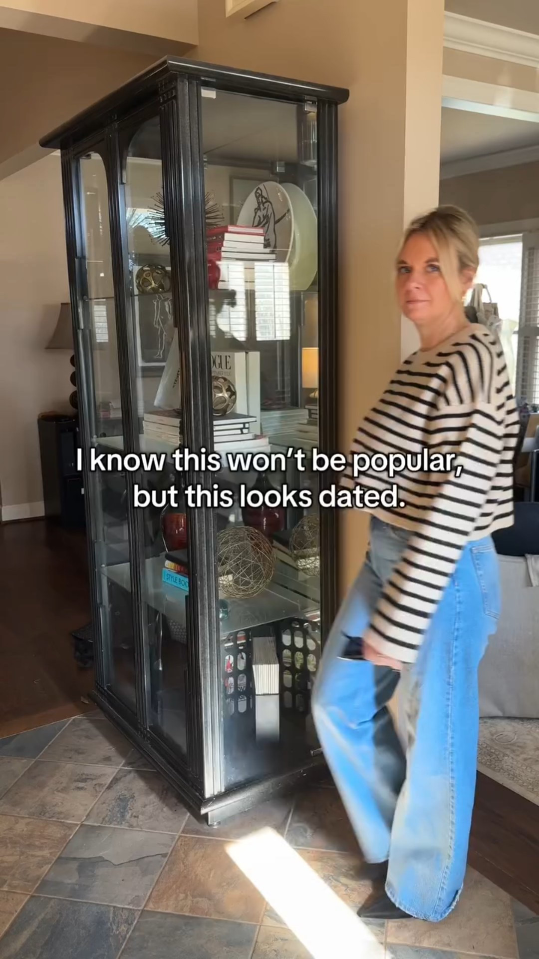 Skinny jeans aren’t the issue — how they’re being styled is. 

When ultra-skinny, ankle-length jeans stop right above the boot, the outfit gets stuck in a very specific era. The cropped break + tight silhouette + short boot combo is what dates the look, not the denim itself. 

Modern winter outfits usually work better with: 
• a longer hem 
• a wider leg 
• or a boot that visually connects to the pant 

This is one of those small tweaks that instantly makes outfits feel current again — without buying a whole new wardrobe.