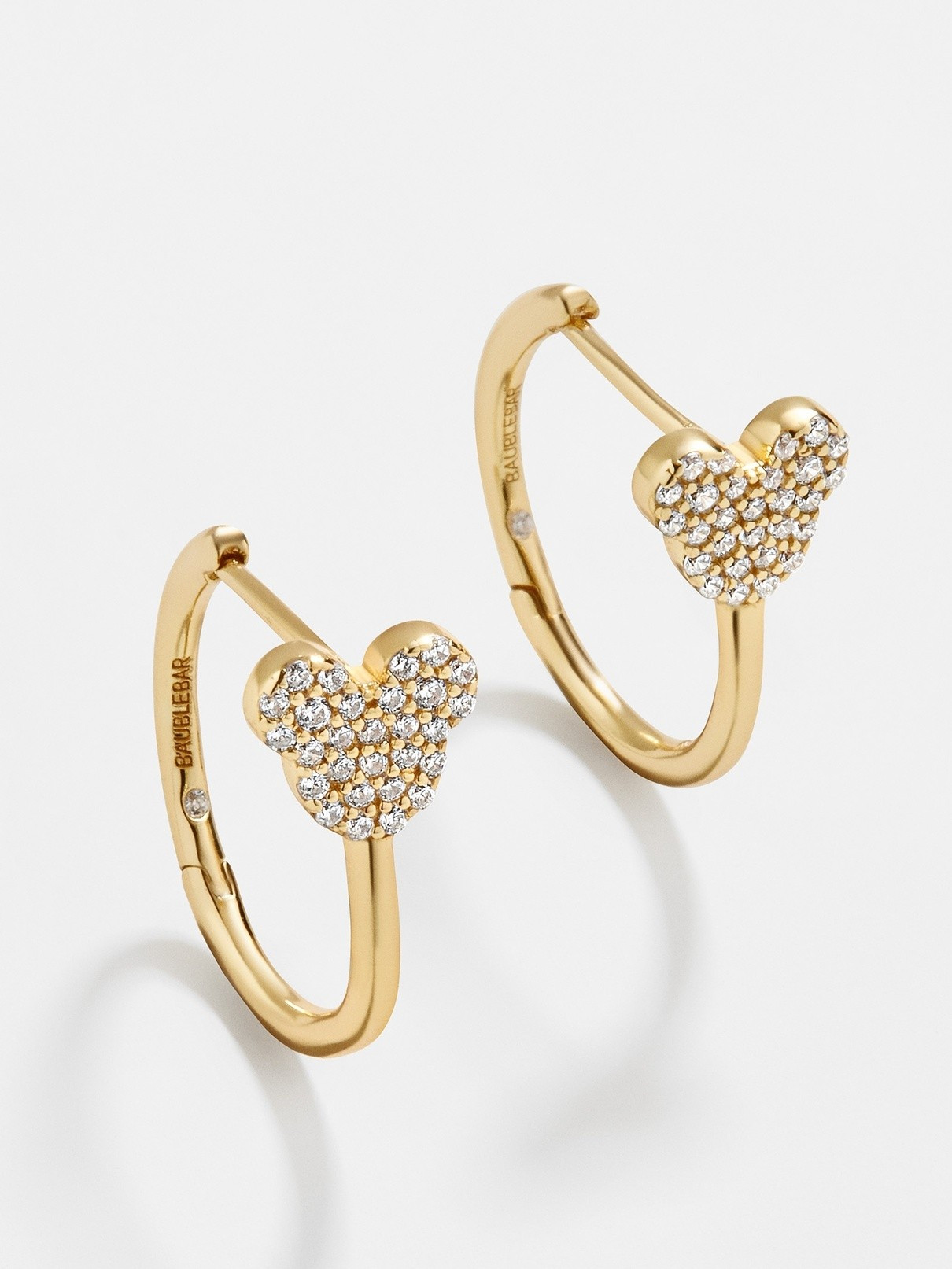Disney 18K Gold Plated Sterling Silver Huggies | BaubleBar (US)