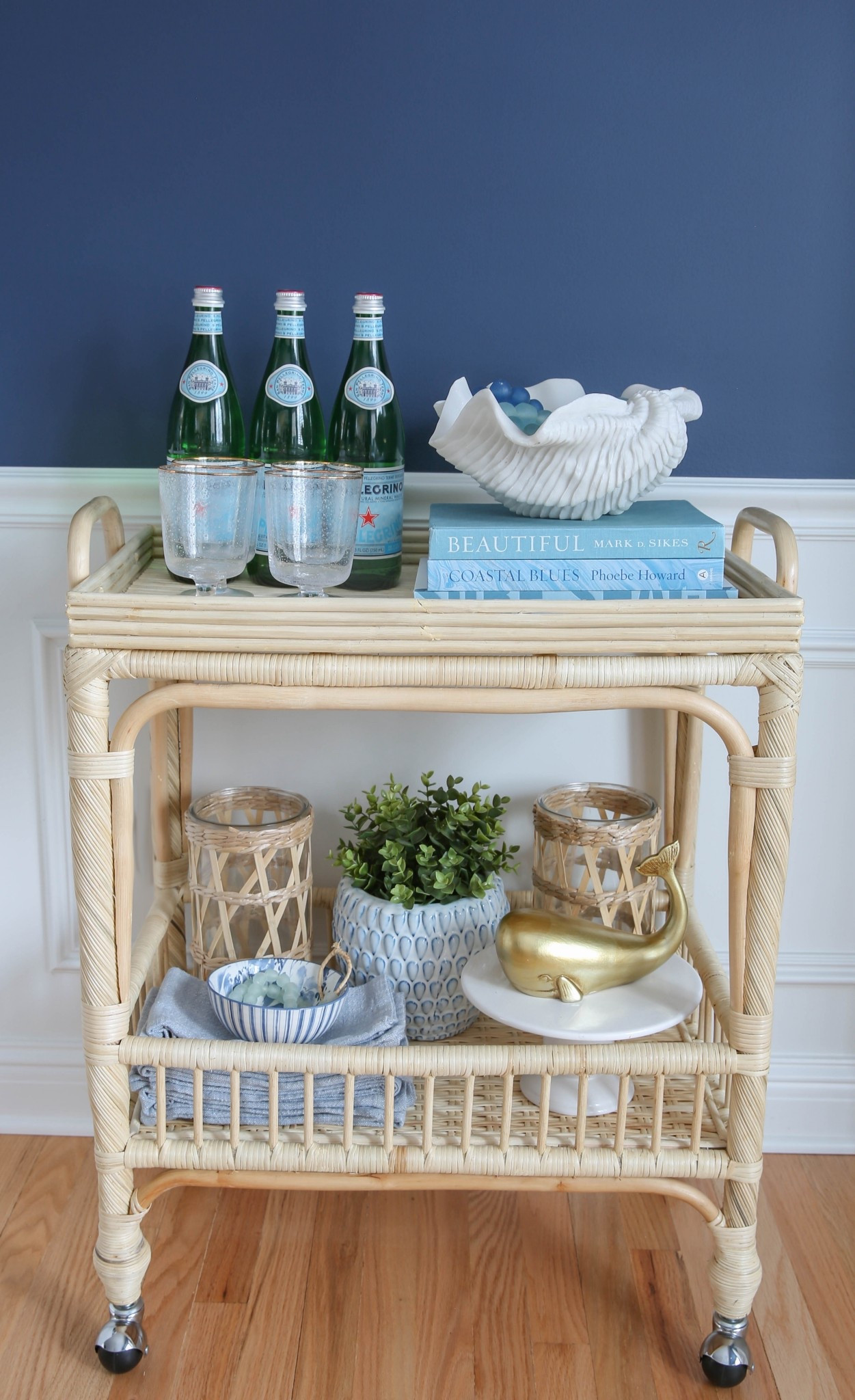 My coastal bar cart styling brings beachy vibes with blue and white accents, natural textures, and curated glassware for a fresh, designer-inspired look. I love how this styled cart makes decorating feel effortless, fun, and coastal chic. 



#LTKOver40 #LTKU #LTKHome