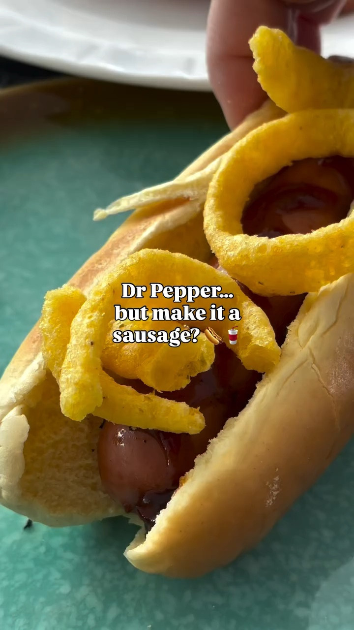 Soda… but on a sausage? 🌭🥤

We fired up the grill after @johnsonville sent over their new Dr Pepper sausage and decided to go all in. Topped it with honey hot BBQ, onion rings, and a little sweet + salty chaos.

First bite verdict: wait… why does this actually work?!

#fizzyglizzy #johnsonville
