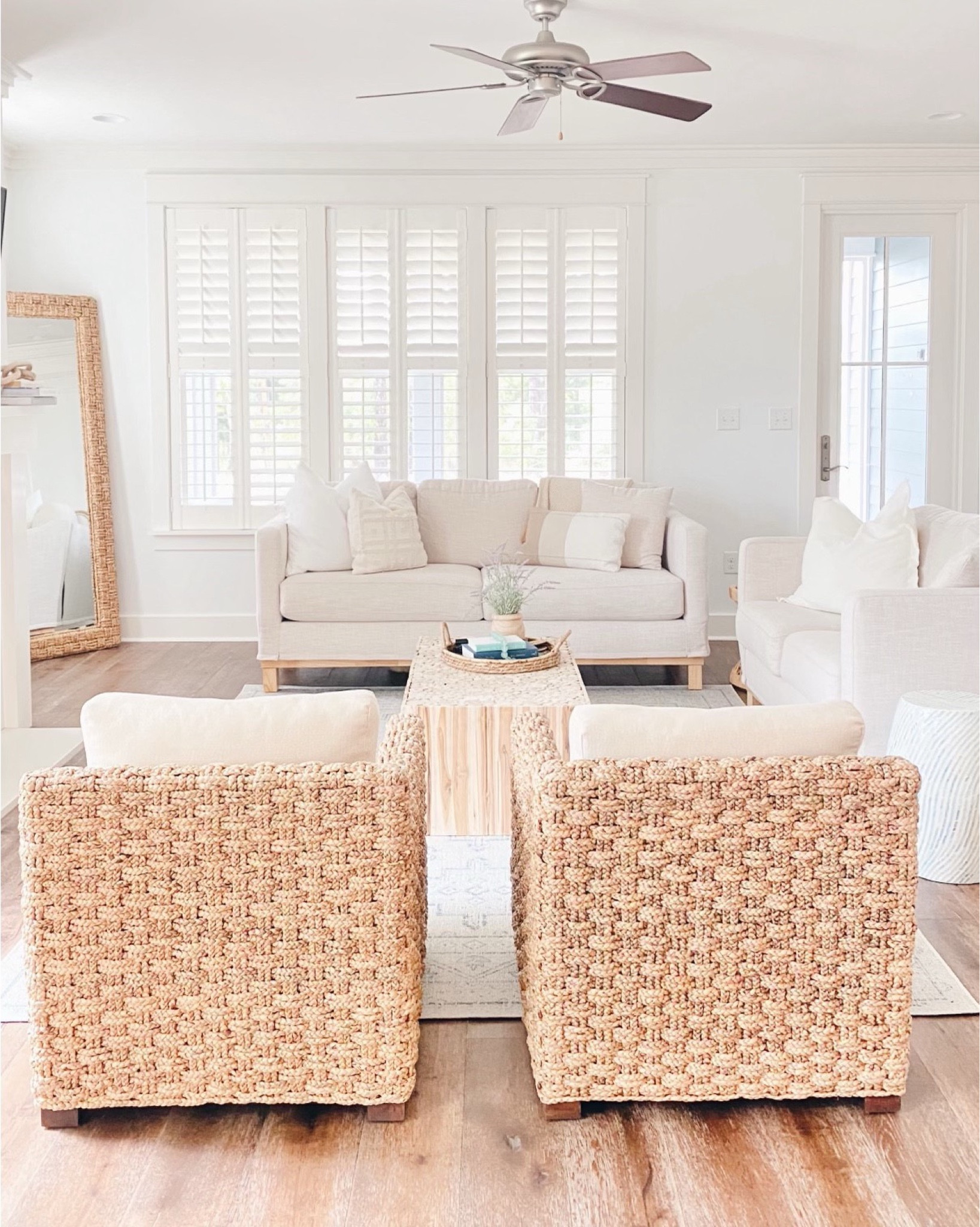 coastal home favorites:
This slip cover sleeper sofa was a great addition to a high traffic two bedroom rental. I prefer a slip cover sofa in our rentals with the amount of kids that we get.This outdoor chair looks and feels really high end and for that reason it can be found in our Gulf front home. It says online it's an indoor chair but ours has been outside on a screened porch for a couple years and still looks great! It also has a matching mirror which I have had in a past home as well! This rug (and nightstands) have been a top seller with my readers. Many of the rugs in our rentals and personal home are from Wayfair 

