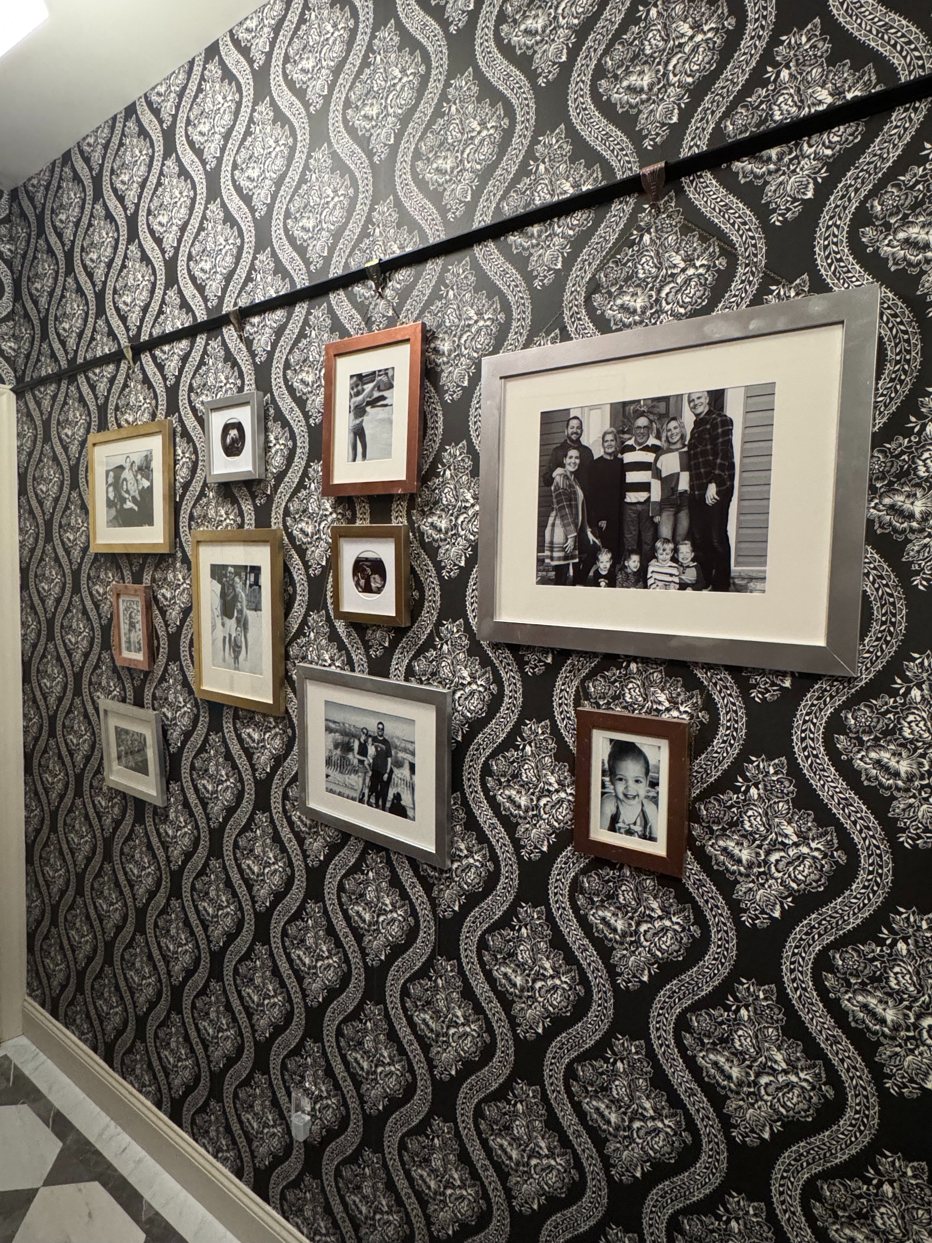 This gallery wall was all about character, flexibility, and zero extra nail holes 🤍 I used a classic picture rail with chains and hooks so frames can be swapped, adjusted, or layered anytime. Mixing gold, silver, and copper frames adds depth and keeps it feeling collected—not matchy. It’s an easy DIY that instantly adds architectural charm and works beautifully in mudrooms, hallways, or staircases. All the frames, rail hardware, chains, and tools I used are linked here for an effortless gallery wall upgrade. 

 #LTKHome #LTKFindsUnder100