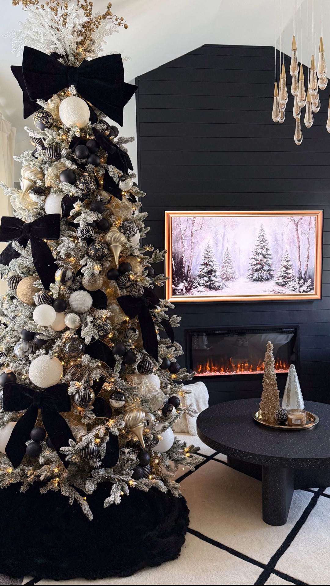 Flocked Christmas tree with black ribbon and black velvet bows for a luxe, moody bedroom vibe. Linking the exact tree, ribbon, and bows so you can recreate this elevated holiday look. Perfect if you want designer-style Christmas décor without the designer price tag. Shop the full bedroom tree setup on LTK.

#LTKSeasonal #LTKHome #LTKHoliday