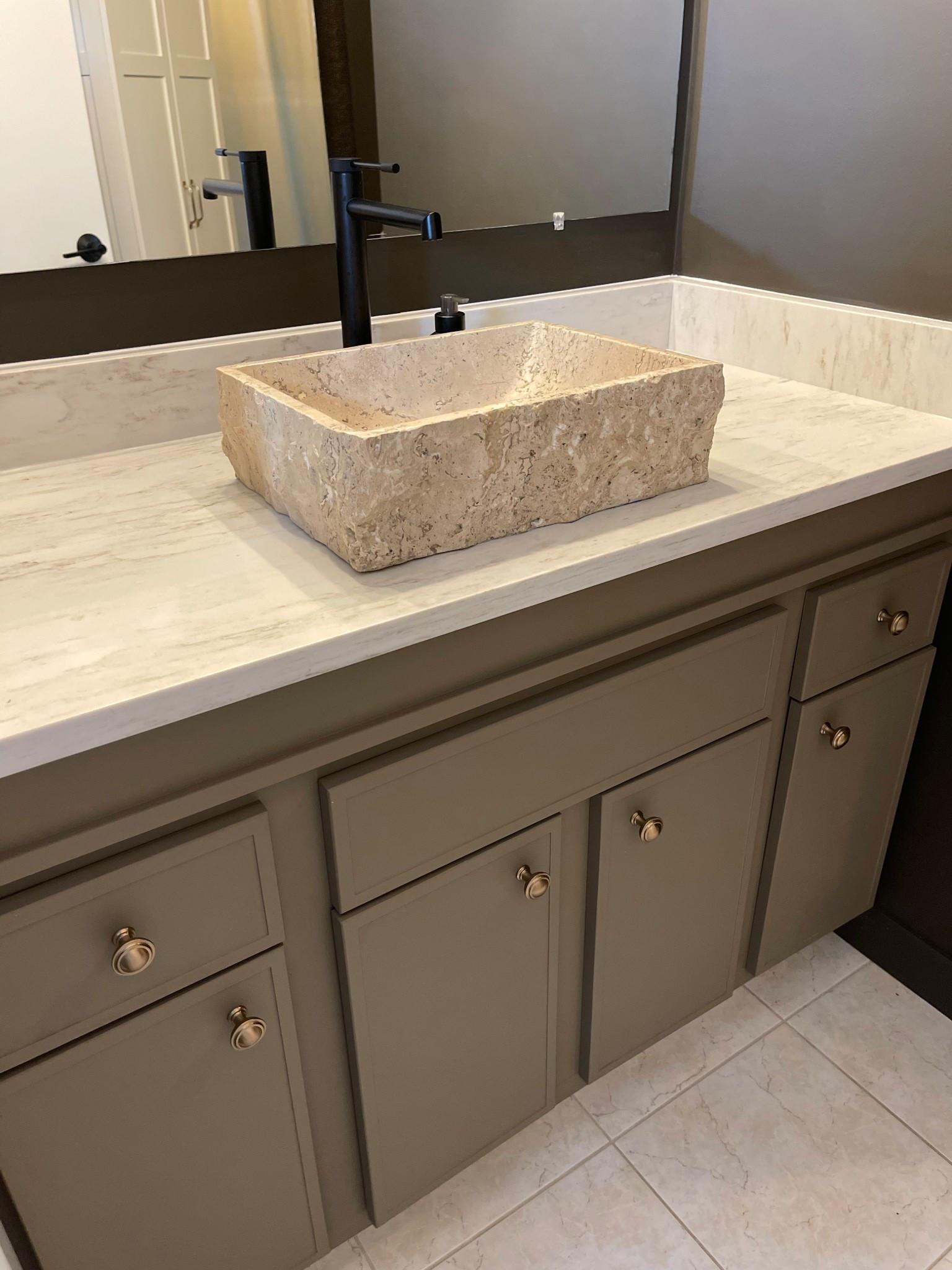 This sink 🥹 it’s a solid Marble Travertine.

I found the sink first, and then planned the entire bathroom makeover around it! 

It’s such a beautiful focal point and I’m so happy with how it came out! Sinks likr these are one of a kind so I’ve linked multiple sinks that look as close as possible to this, but even when you order, they say there can be variation in the natural stone. 


Remember that you will need a taller faucet if you’re installing a vessel sink. 

#LTKHome