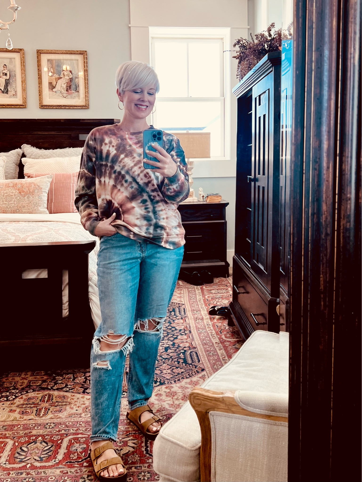 Loving these#americaneagle #momjeans and #Walmart is full of surprises this year- check out this super fun tie died crew neck sweatshirt. Also, wearing my most favorite Birkenstock “look for less” that I feel like I live in! #casualfashion #casual #comfy #over50 #playfulfashion 

#LTKFindsUnder50 #LTKOver40