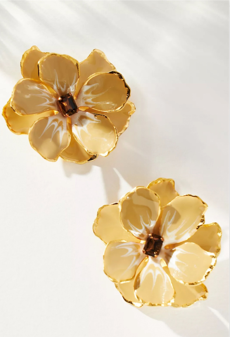 Floral statement earrings- 40% off at anthro now

#LTKsalealert #LTKGiftGuide #LTKSeasonal