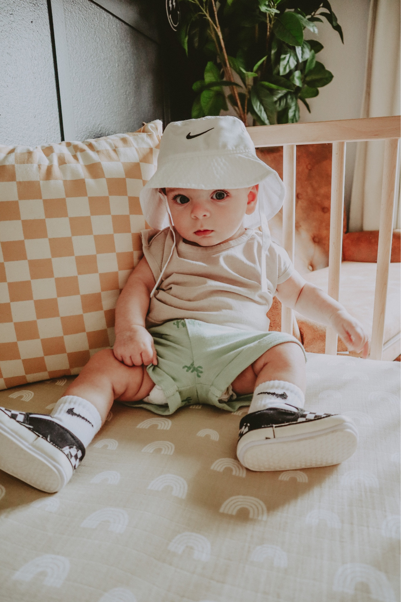 Infant baby boy outfit - checkered crib shoes, checkered pillow, neutral rainbow crib sheets, Nike baby bucket hat, Nike socks 🖤

#LTKhome #LTKkids #LTKbaby
