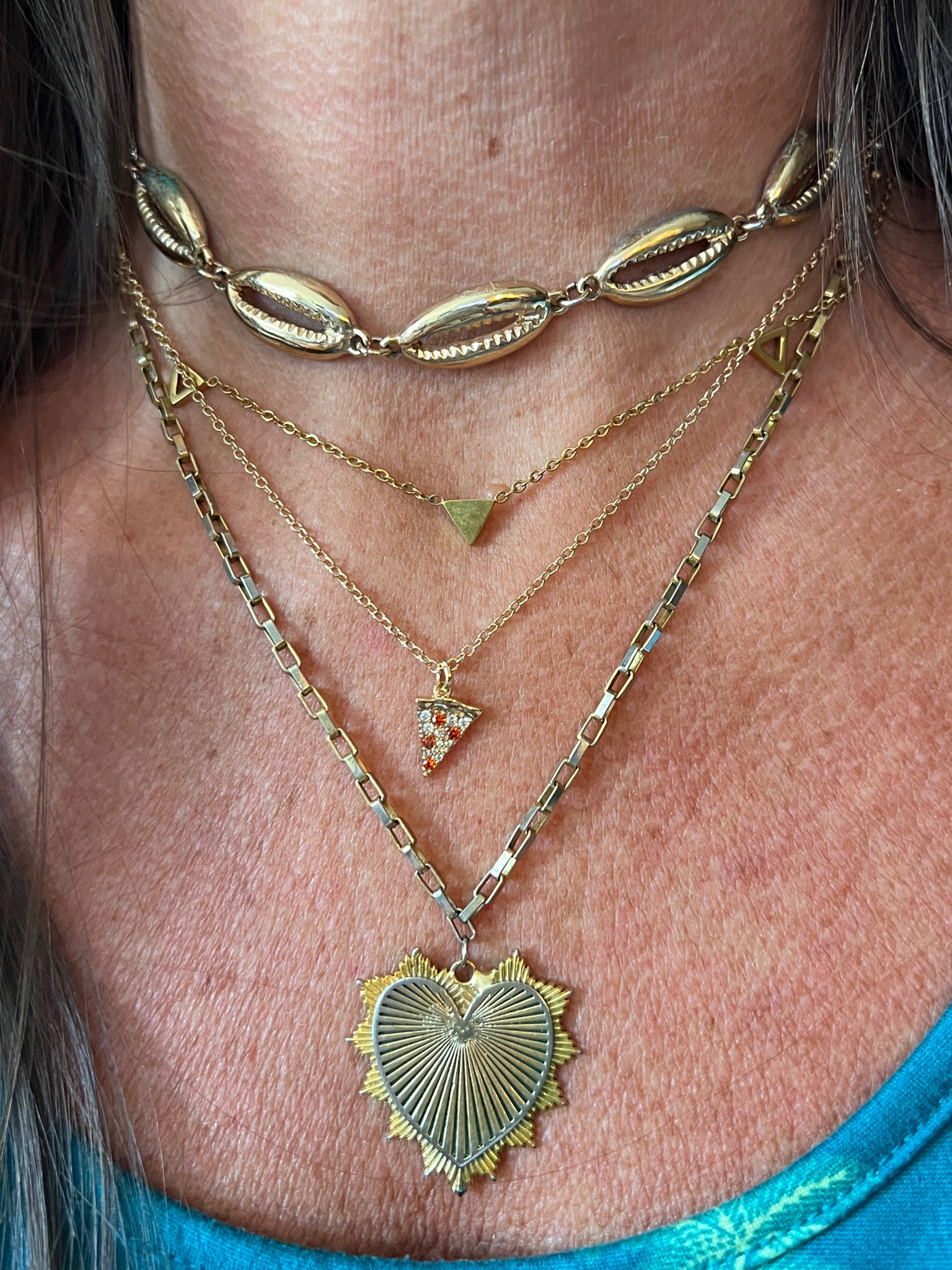 Some of my favorite necklaces! Heart necklace is linked on my LinkTree! https://linktr.ee/linz30a

Pizza necklace, triangle necklace, kinsley armelle, Shein finds, dainty necklace, gold necklace, gold accessories #blushpink #winterlooks #winteroutfits 
#winterfashion #wintertrends #shacket #jacket #sale #under50 #under100 #under40 #workwear #ootd #bohochic #bohodecor #bohofashion #bohemian #contemporarystyle #modern #bohohome #modernhome #homedecor #amazonfinds #nordstrom #bestofbeauty #beautymusthaves #beautyfavorites #goldjewelry #stackingrings #toryburch #comfystyle #easyfashion #vacationstyle #goldrings #goldnecklaces #fallinspo #lipliner #lipplumper #lipstick #lipgloss #makeup #blazers #primeday #StyleYouCanTrust #giftguide #LTKRefresh #LTKSale #springoutfits #fallfavorites #LTKbacktoschool #fallfashion #vacationdresses #resortfashion #summerfashion #summerstyle #rustichomedecor #liketkit #highheels #Itkhome #Itkgifts #Itkgiftguides #springtops #summertops #Itksalealert #LTKRefresh #fedorahats #bodycondresses #sweaterdresses #bodysuits #miniskirts #midiskirts #longskirts #minidresses #mididresses #shortskirts #shortdresses #maxiskirts #maxidresses #watches #backpacks #camis #croppedcamis #croppedtops #highwaistedshorts #goldjewelry #stackingrings #toryburch #comfystyle #easyfashion #vacationstyle #goldrings #goldnecklaces #fallinspo #lipliner #lipplumper #lipstick #lipgloss #makeup #blazers #highwaistedskirts #momjeans #momshorts #capris #overalls #overallshorts #distressedshorts #distressedjeans #newyearseveoutfits #whiteshorts #contemporary #leggings #blackleggings #bralettes #lacebralettes #clutches #crossbodybags #competition #beachbag #halloweendecor #totebag #luggage #carryon #blazers #airpodcase #iphonecase #hairaccessories #fragrance #candles #perfume #jewelry #earrings #studearrings #hoopearrings #simplestyle #aestheticstyle #designerdupes #luxurystyle #bohofall #strawbags #strawhats #kitchenfinds #amazonfavorites #bohodecor #aesthetics #spanx #spanxleggings #spanxfauxleatherleggings
Back to school, fall fashion, shell necklace 

#LTKunder50 #LTKstyletip #LTKFind