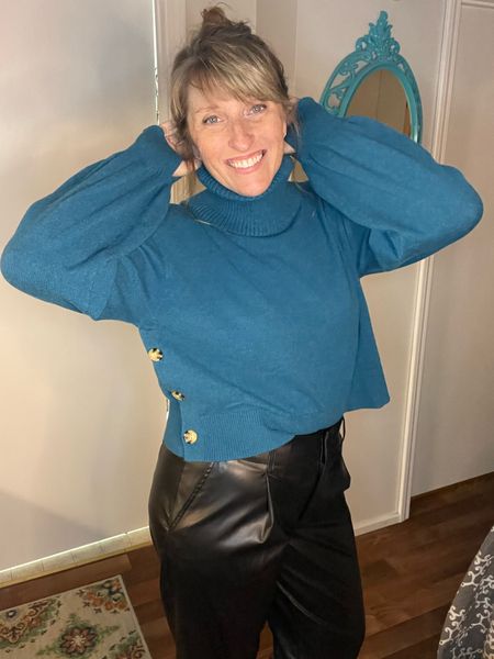 Crapped sweater but make it long enough to not show skin! Cute turtleneck sweater with side button detail and thumb holes. Cold weather fave and pairs well with Vegan leather cropped pants 

#LTKstyletip #LTKSeasonal #LTKunder50