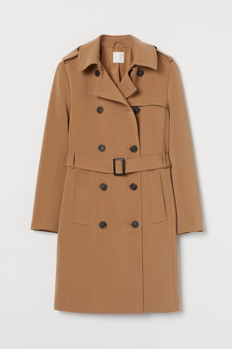 Double-breasted, knee-length trenchcoat in woven fabric with buttoned shoulder tabs. Belt with a ... | H&M (UK, MY, IN, SG, PH, TW, HK)