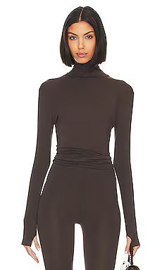 Norma Kamali Slim Fit Long Sleeve Turtle Top in Chocolate from Revolve.com | Revolve Clothing (Global)
