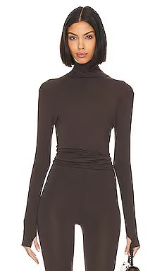 Norma Kamali Slim Fit Long Sleeve Turtle Top in Chocolate from Revolve.com | Revolve Clothing (Global)