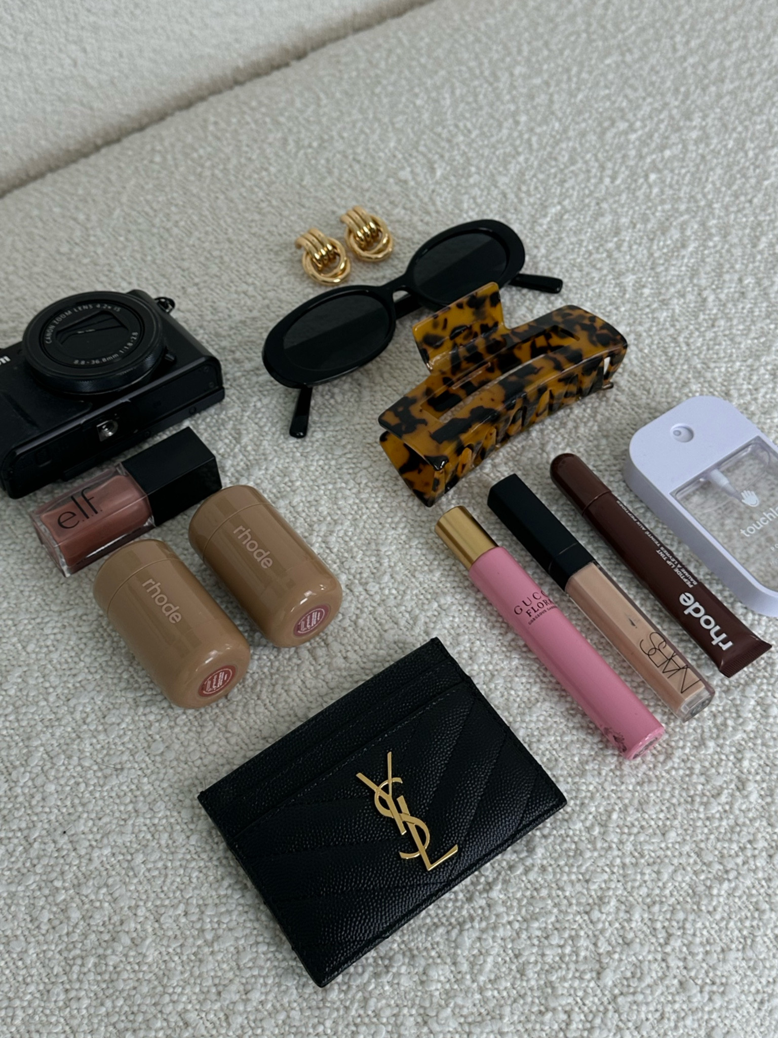 Aesthetic what’s in my bag layout! #aesthetic #pinterestaesthetic #canong7xmarkii #wallet #beauty #beautyessentials #clawclip #sunglasses #rhode #cleangirl #cleangirlaesthetic