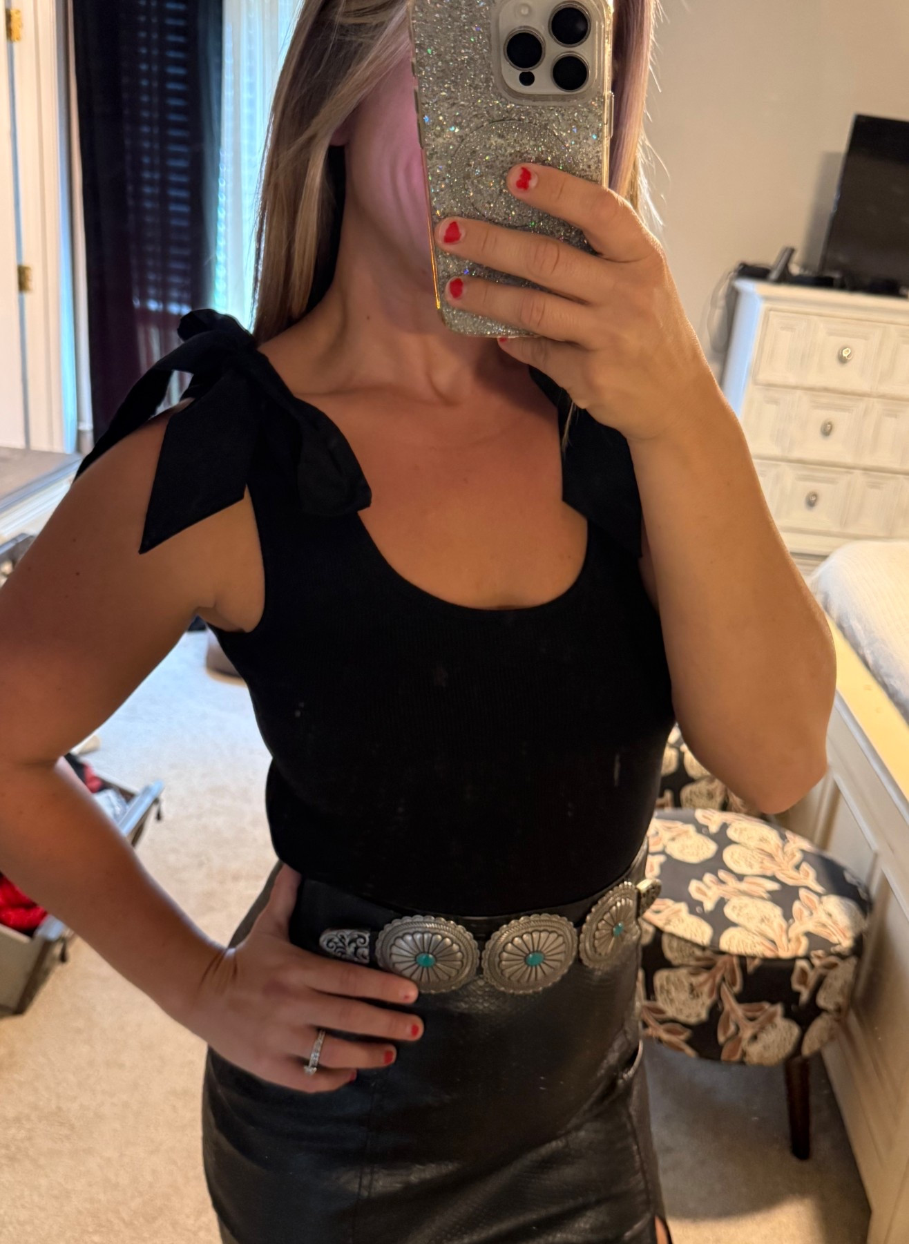 This tank top with the bow ties on the shoulders is adorable! Wearing the size small! 

#LTKSeasonal #LTKFindsUnder50 #LTKStyleTip