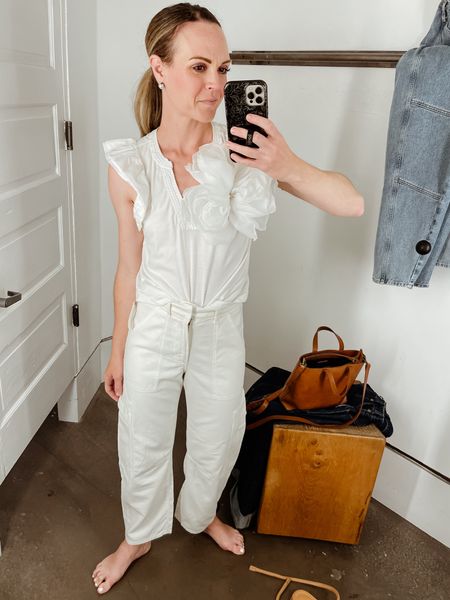 My favorite pants I own in 3 colors. Just ordered this white pair. I sized down for a closer fit, wearing a 24. 