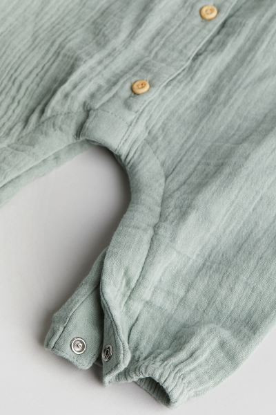 Frill-trimmed muslin romper suit - Dusty green - Kids | H&M GB | H&M (UK, MY, IN, SG, PH, TW, HK)
