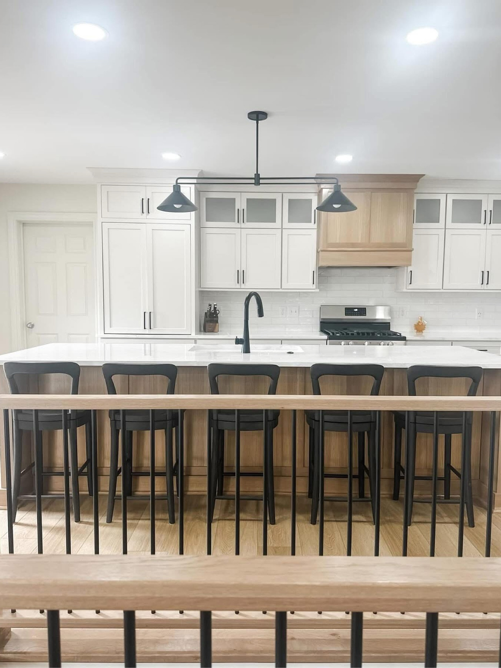 Black accents provide perfect contrast with white kitchen cabinets for a classic, timeless kitchen design.

#LTKHome #LTKFamily #LTKParties