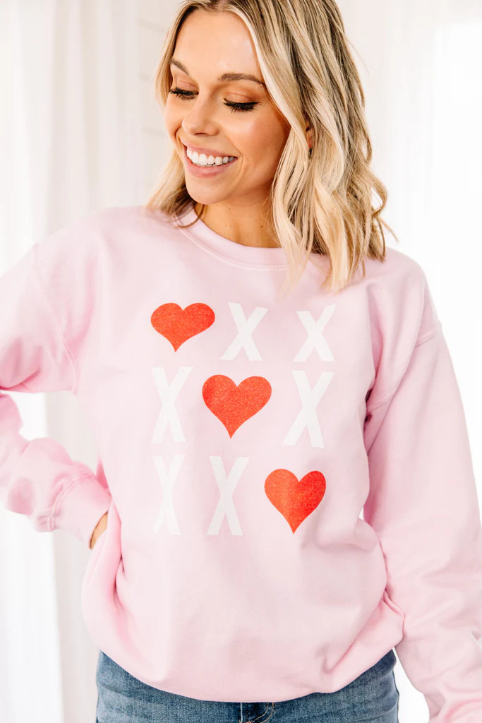 X's and O's Light Pink Graphic Sweatshirt | The Mint Julep Boutique