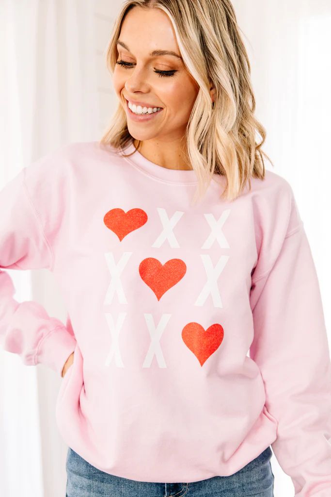 X's and O's Light Pink Graphic Sweatshirt | The Mint Julep Boutique