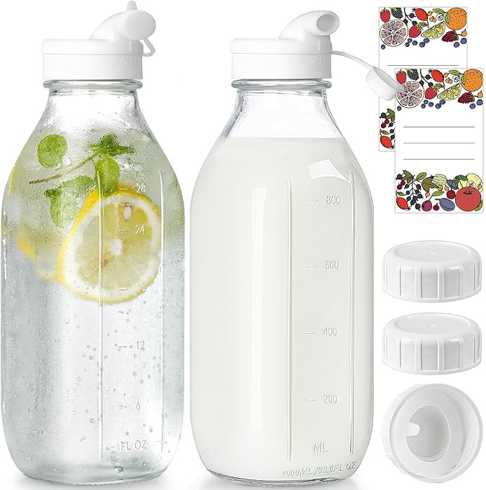 2 Pack Glass Milk Bottle with 2 Dispenser Caps, 100% Airtight Heavy Duty Screw Lid. 32 Oz Reusabl... | Amazon (US)