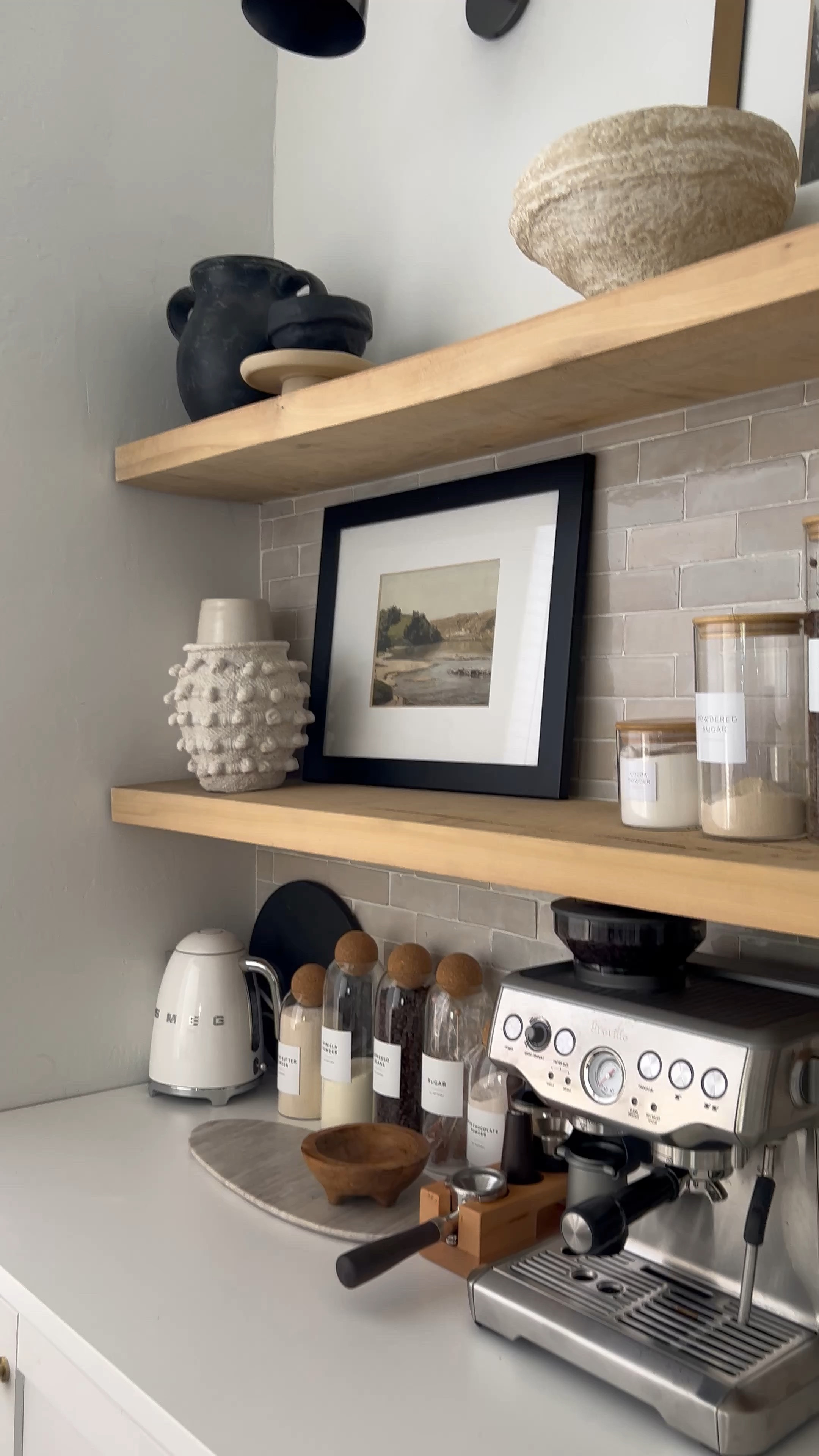 Coffee bar styling 
Minka pot
Breville espresso machine 
SMEG kettle
Wooden cheese board 
Glass canisters 
Pitcher 
Decorative books
Amazon Finds 


#LTKhome #LTKunder50 #LTKunder100