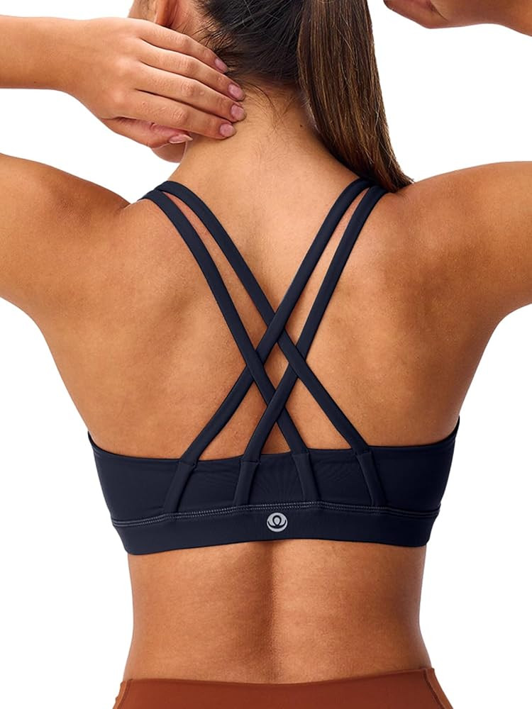 Women's Strappy Sports Bras Light Compression Crop Criss Cross Back Padded Workout Yoga Bra Suppo... | Amazon (US)